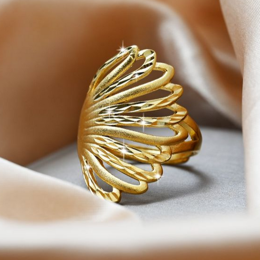 Elegant gyllen, lysende ring